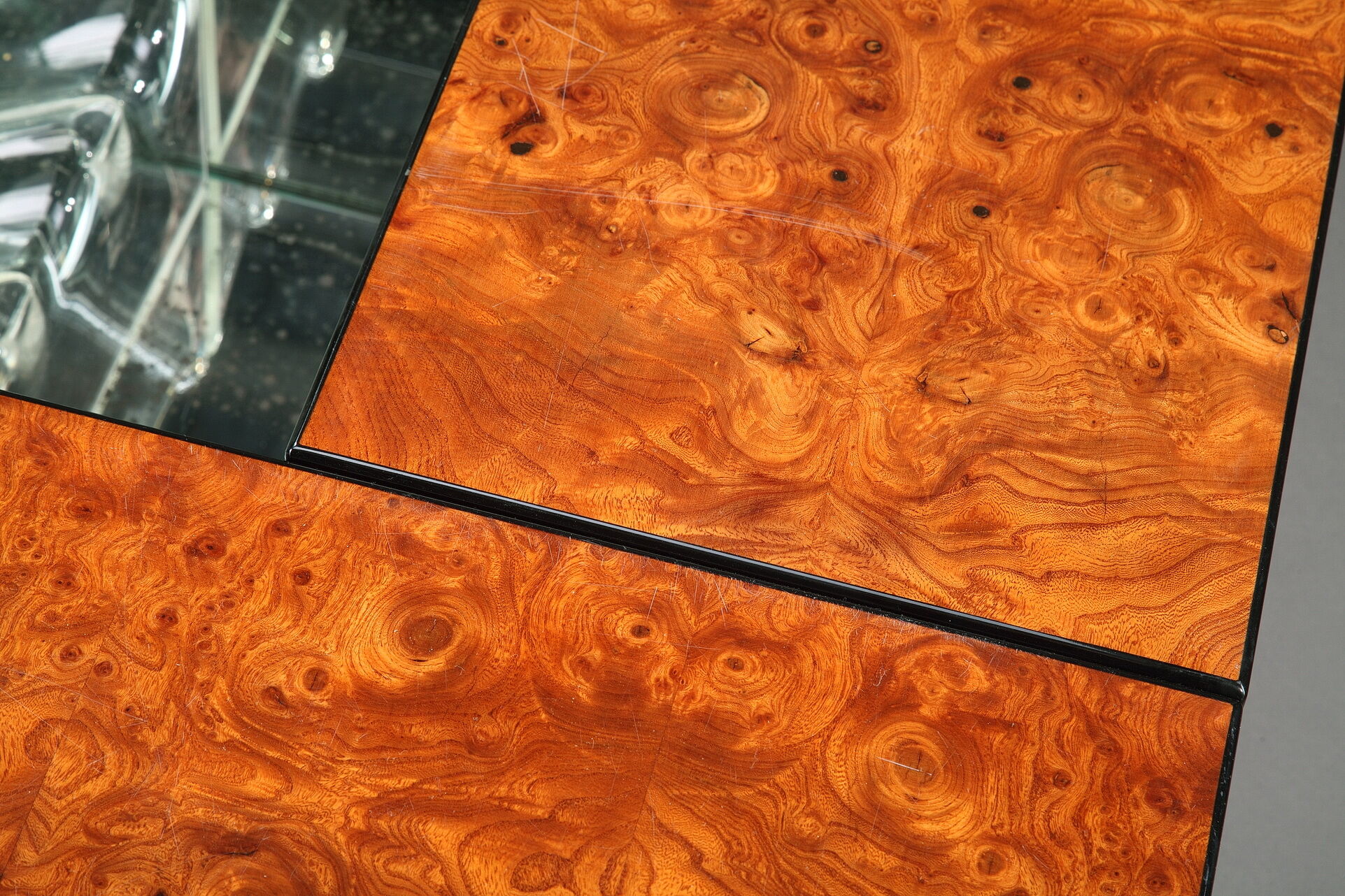 Coffee table in magnifying glass of elm by Paul Michel