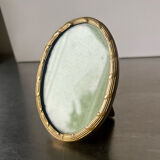 Metal gold colored oval picture frame brass