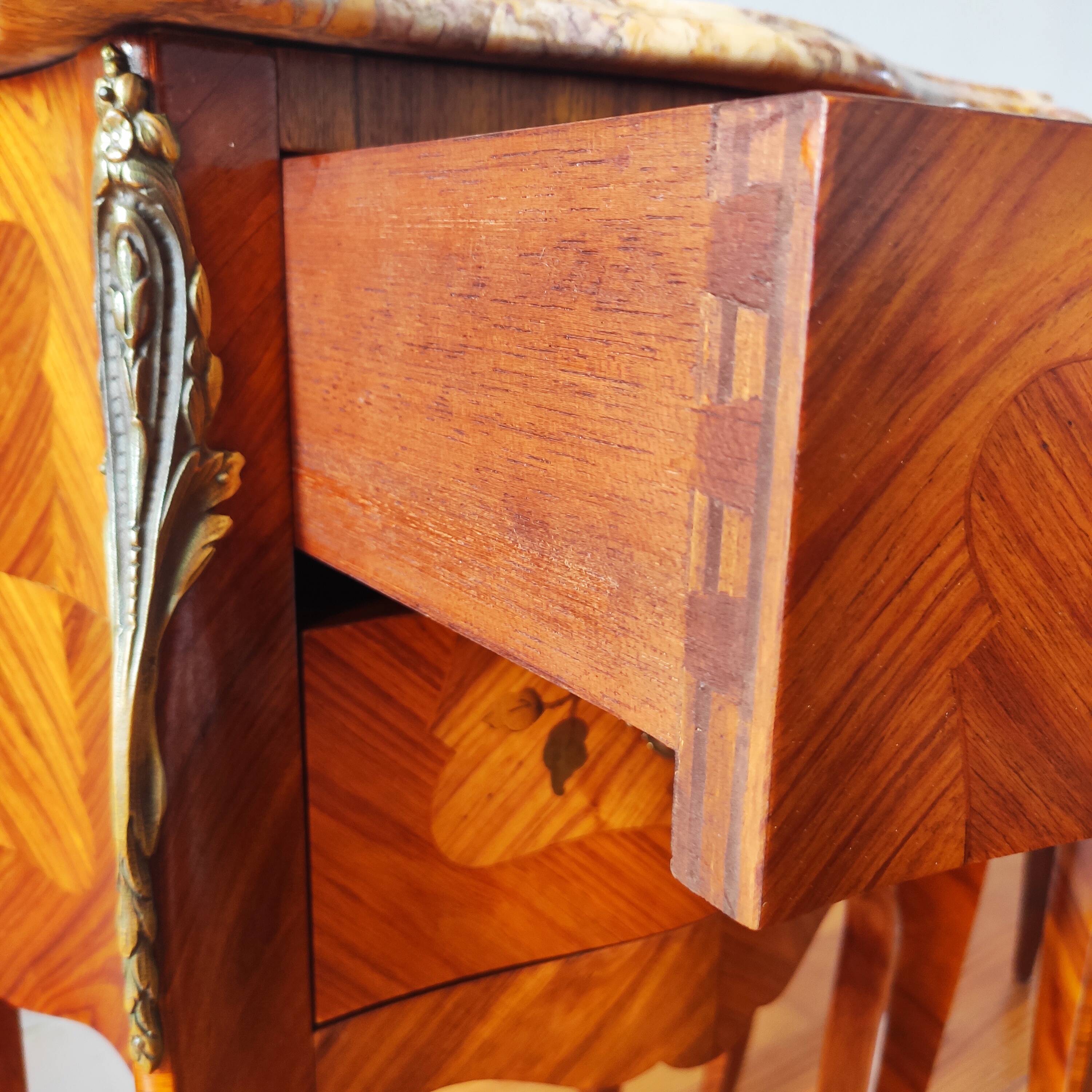 Pair of French Louis XV style bedside tables.