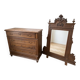 Antique wooden commode with marble top and mirror.