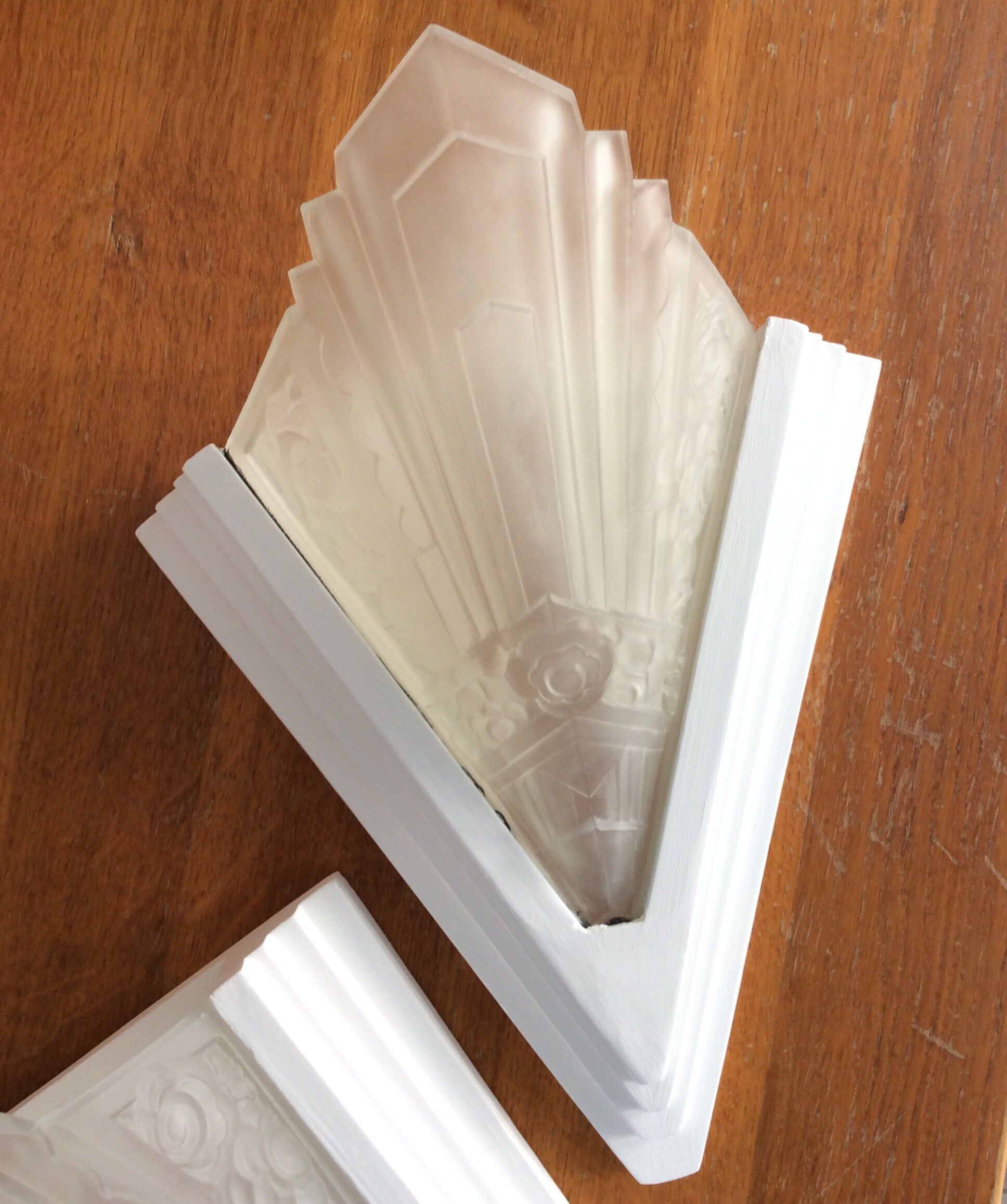 Pair of art deco-style pressed glass sconces