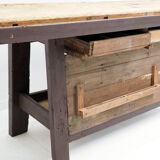 Brown painted workbench with shelf and drawers