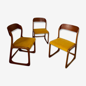 Set of 3 old Baumann designer sled chairs from the 60s in wood and mustard yellow fabric