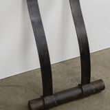 Artisanal wrought iron and cast glass leaning console table