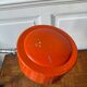 Orange workshop lamp with a clamp – 1970s