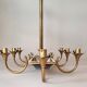 Eight-light chandelier in gilded brass and blue, 1950.