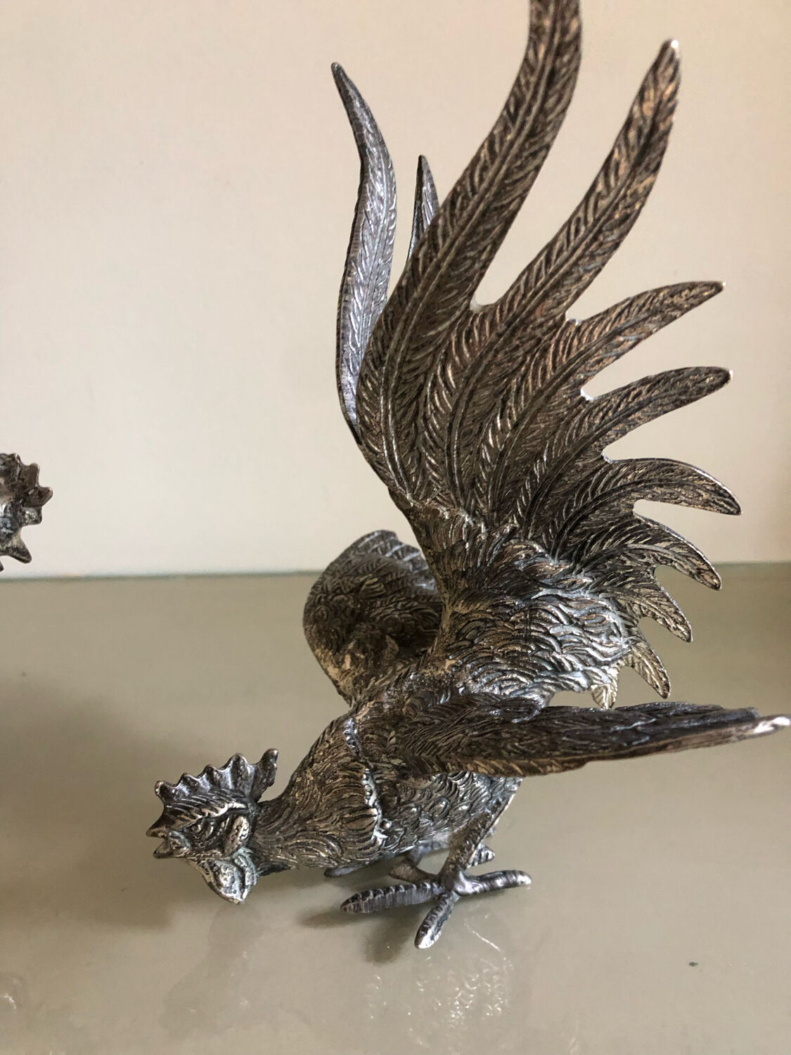 Vintage silver metal roosters