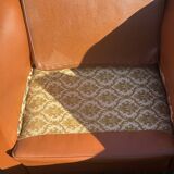 pair of leather clubs