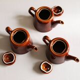 3 brown glazed ceramic teapots