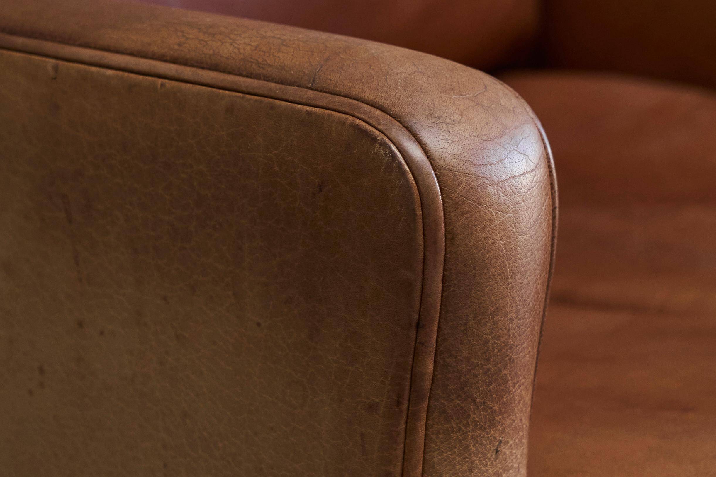 1970s patinated leather Scandinavian lounge chair