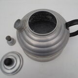 old aluminum kettle with a sufffloating system