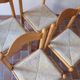 4 solid pine chairs, straw seats, shaped backrest.