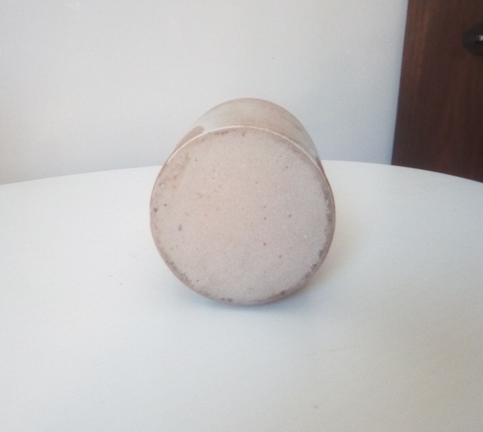 Vintage pitcher jug in sandstone