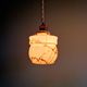Art Deco trio of suspensions in opaline and marbled ouraline, Scailmont, 1920-30.