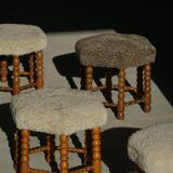 A hexagonal oak stool, seat refurbished in lambswool, Danish design from the 1950s.