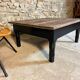 Raw wood coffee table - black legs