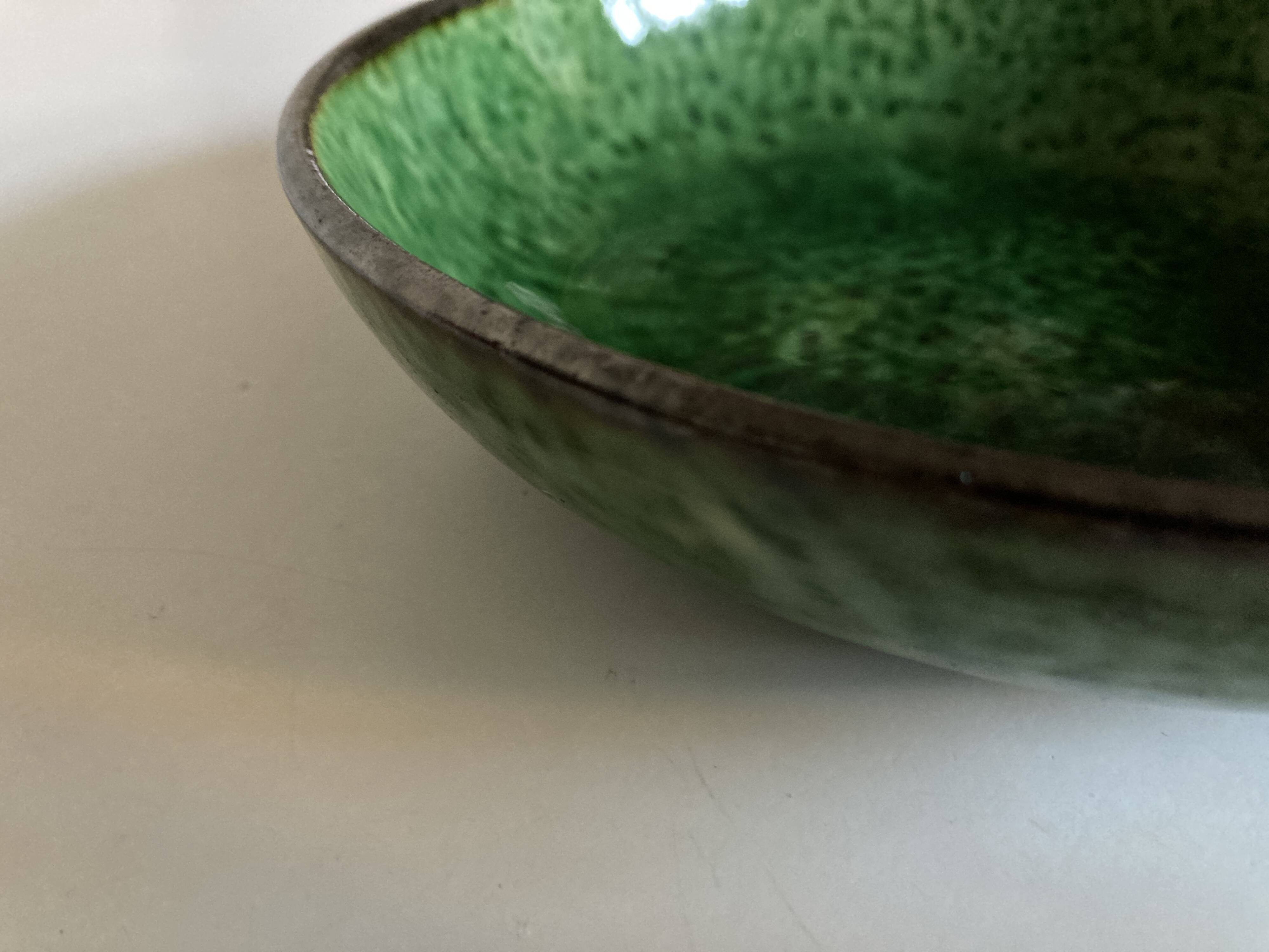 Aegitna hollow dish on heel in green glazed earthenware