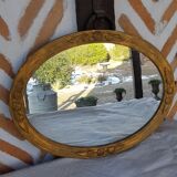 Art Deco golden oval mirror