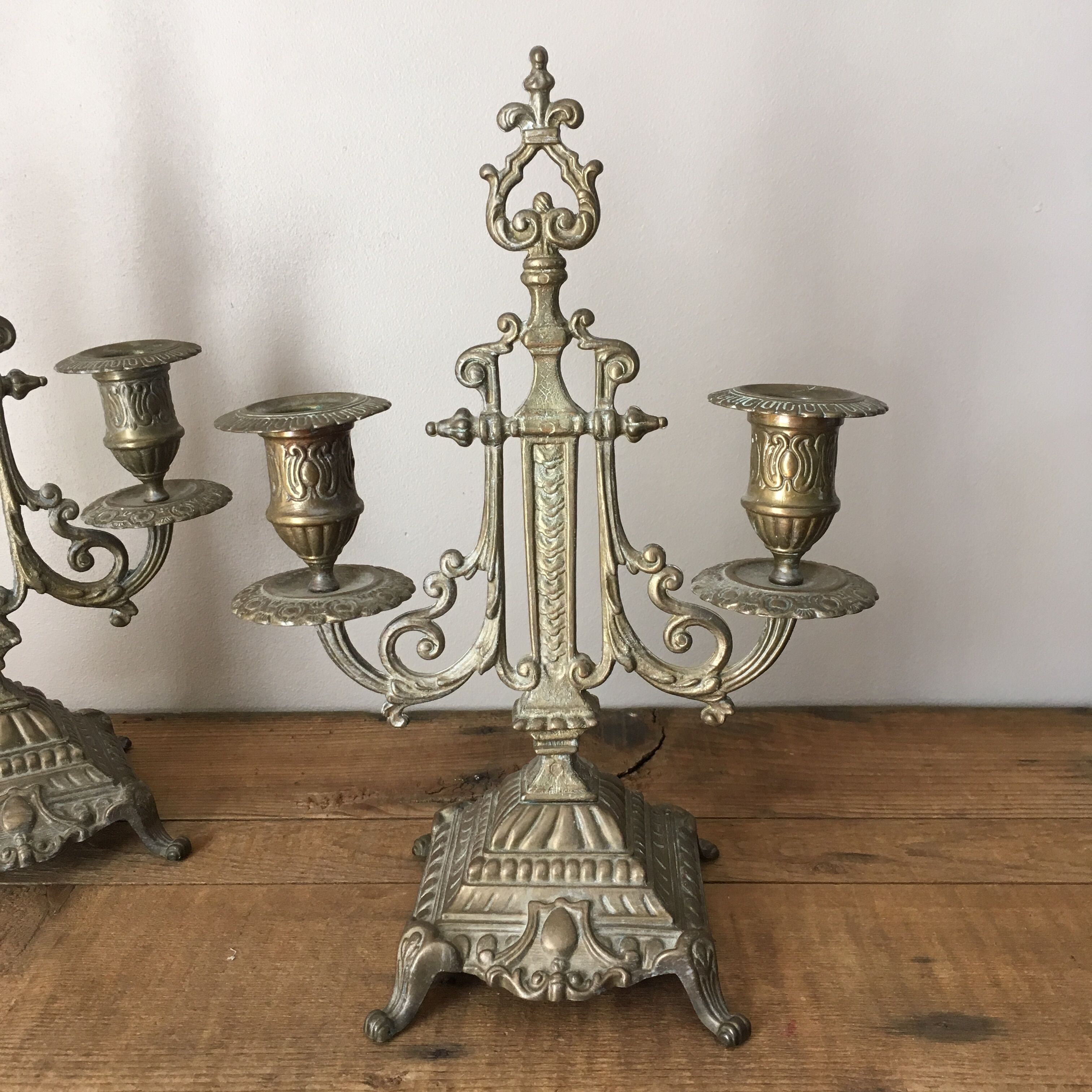 2 gold metal candlesticks