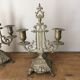 2 gold metal candlesticks