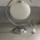 Glass and metal designer lamp