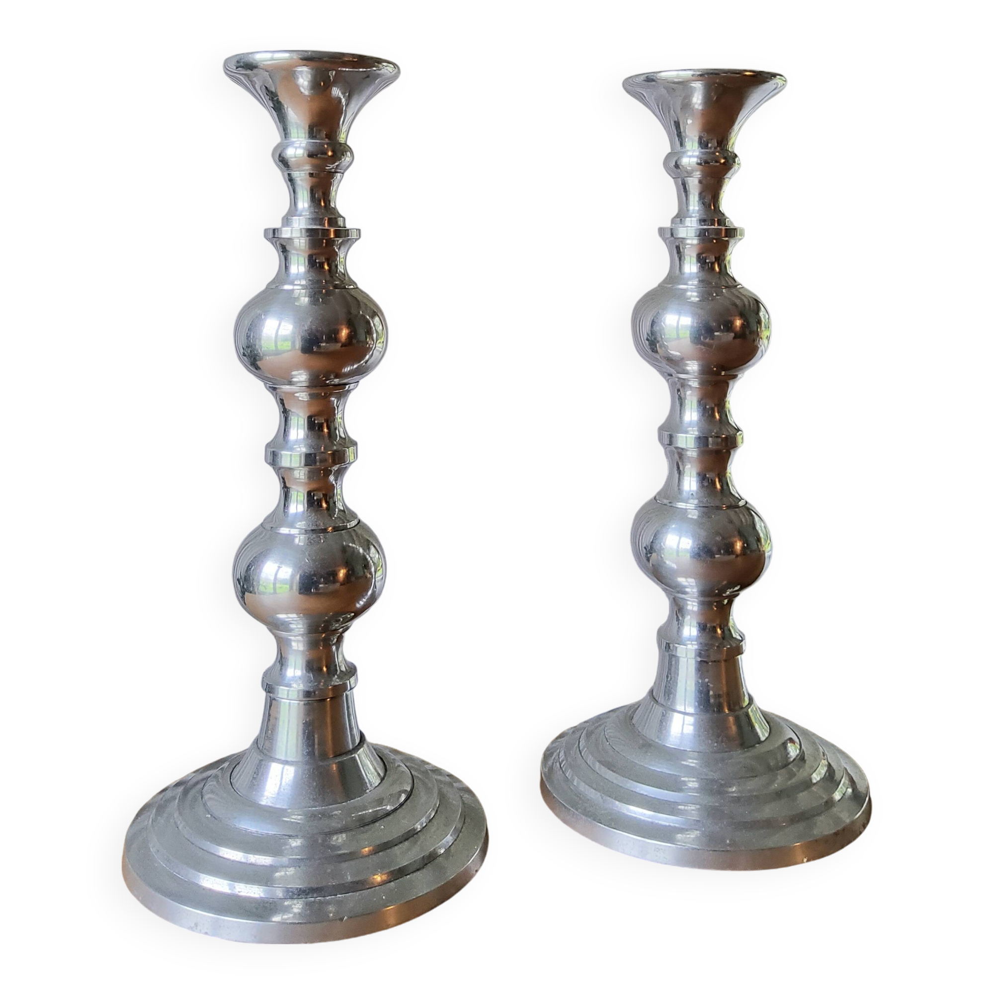 Pair of antique chrome metal candlesticks