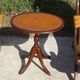 Small side table with an oval top in English style.