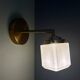 Vintage art deco globe wall lamp in white opaline