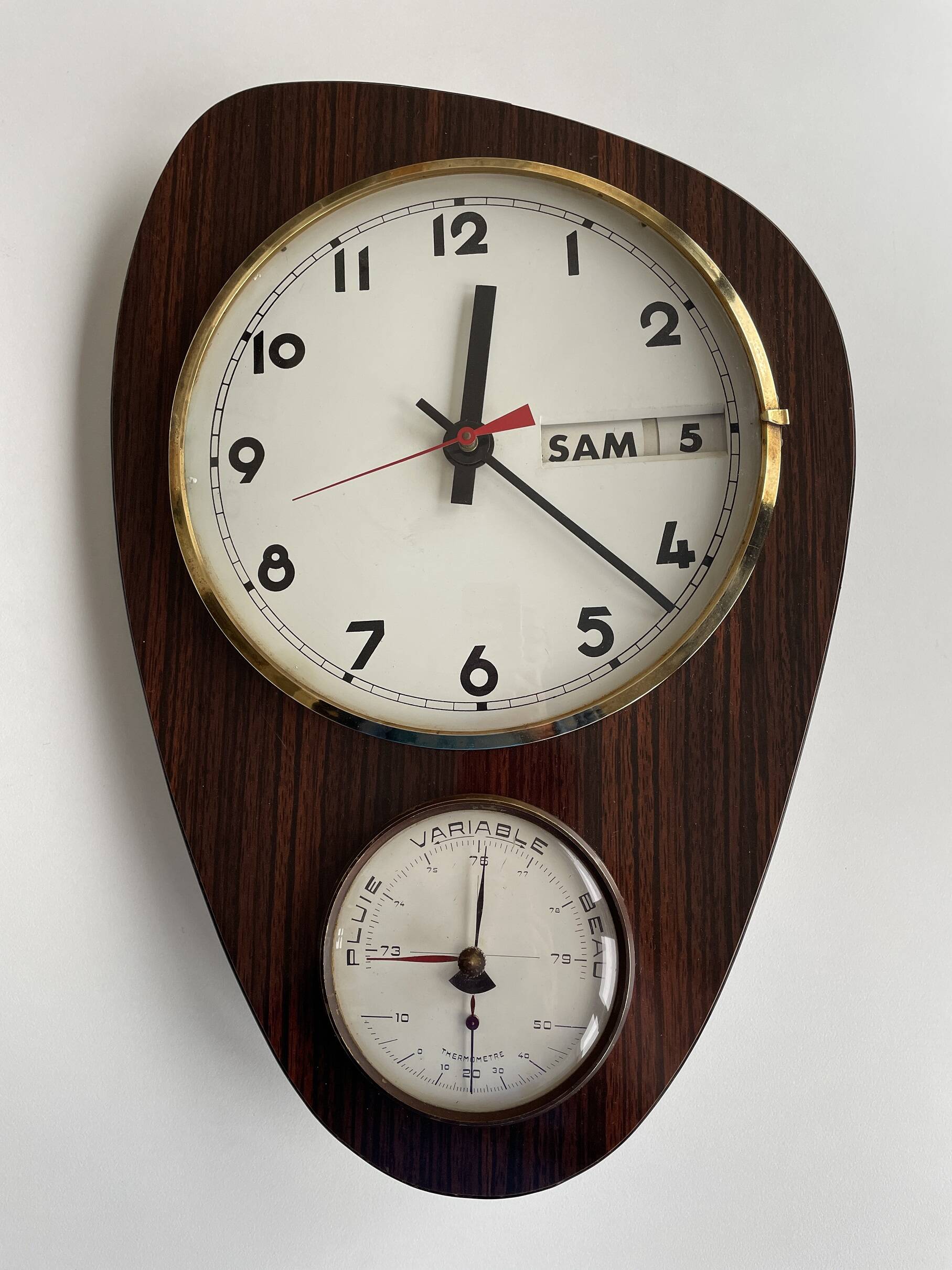 Vintage 1960s wall clock with thermometer and date