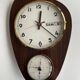 Vintage 1960s wall clock with thermometer and date
