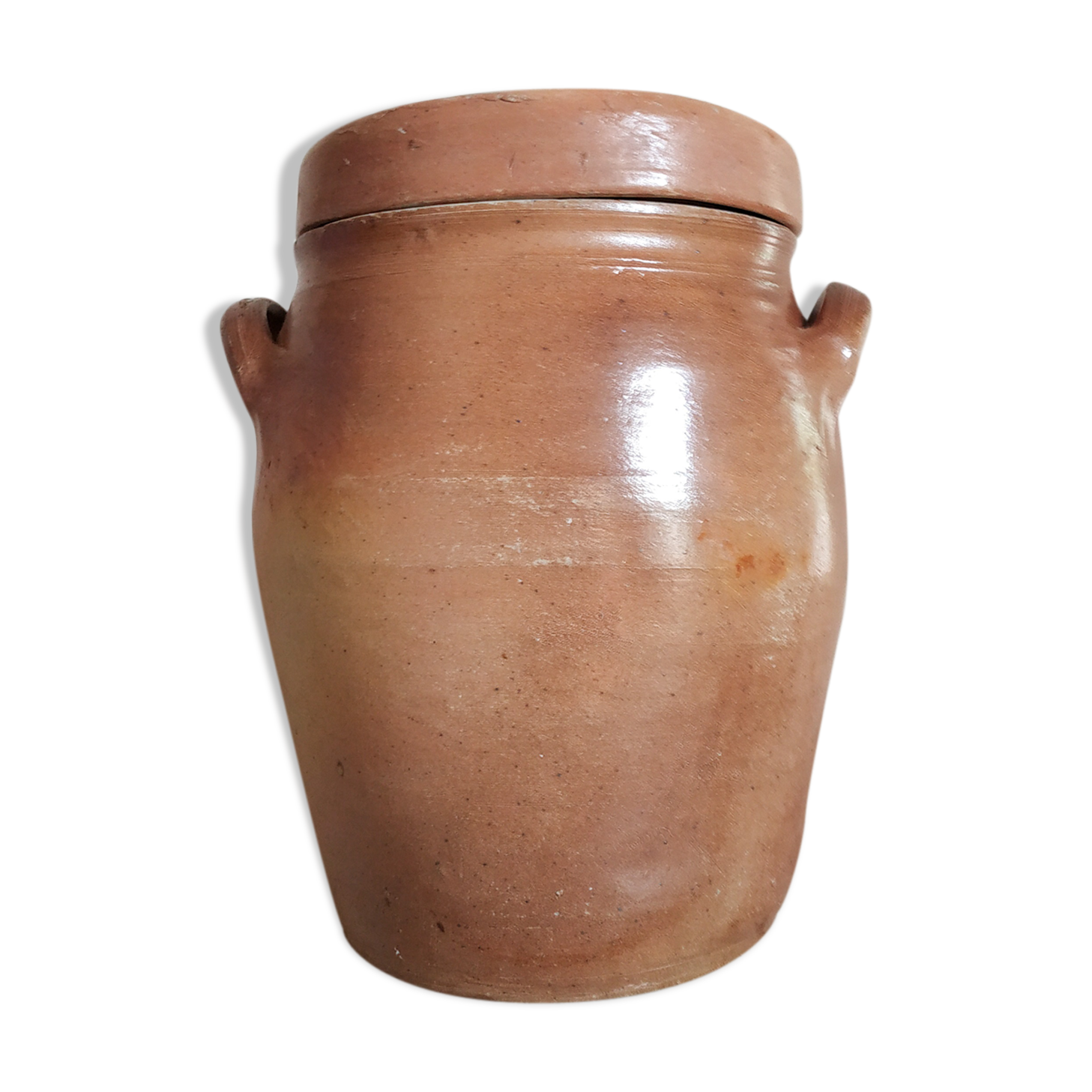 Old terracotta pot with lid