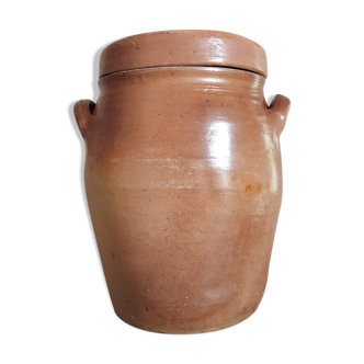 Old terracotta pot with lid