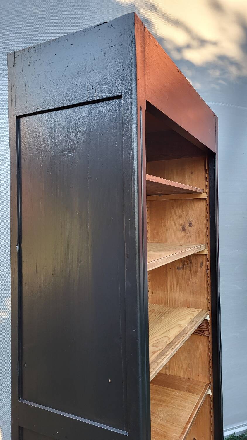 Two-tone black and honey bookcase