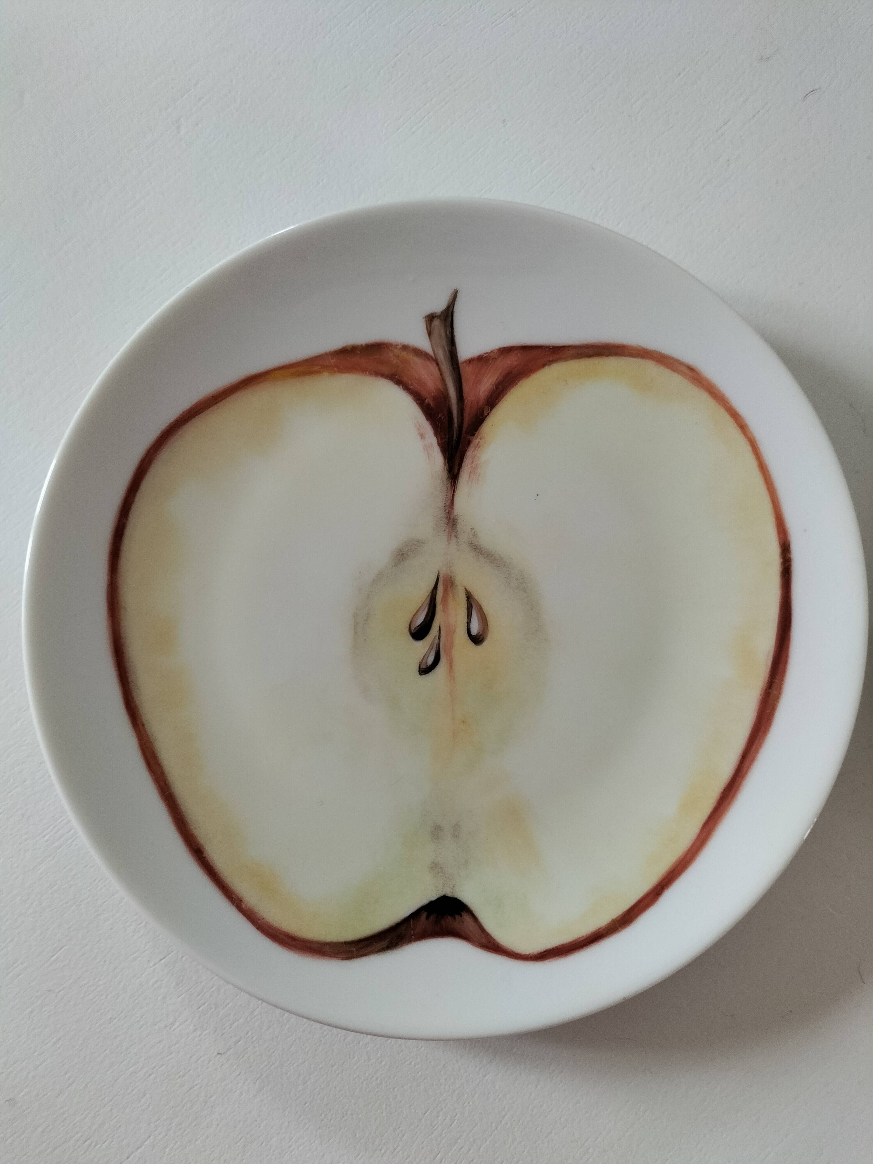 5 hand-painted dessert plates with stylised fruit designs.