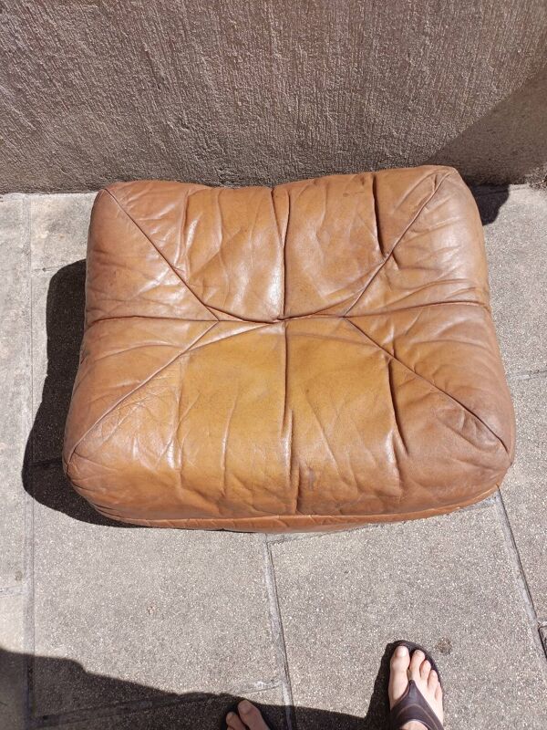 Pouf en cuir vintage
