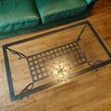 Black wrought iron coffee table and Roche Bobois glass top