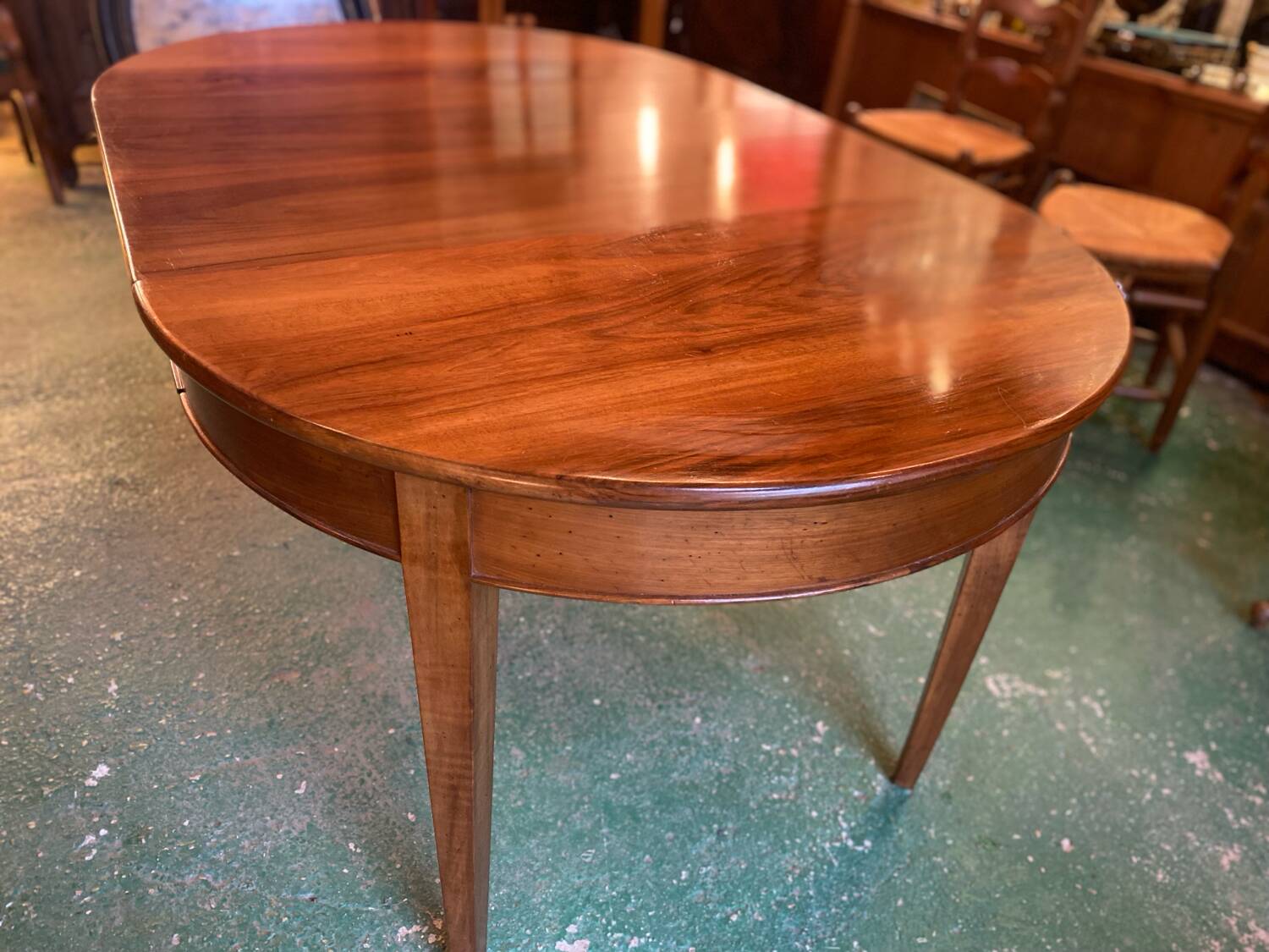 Louis XVI style oval walnut extendable table