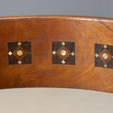 Central European armchair from the early 20th century with an inlaid backrest.