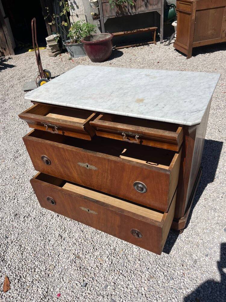 Commode with a white marble top