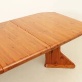 Large extendable Danish dining table in solid pine, 1970s.