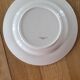 Une assiette plate Sarreguemines jaune et blanc