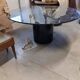 Black lacquered glass table and glass in the hoof style, Italy.