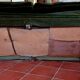 Antique green velvet sofa