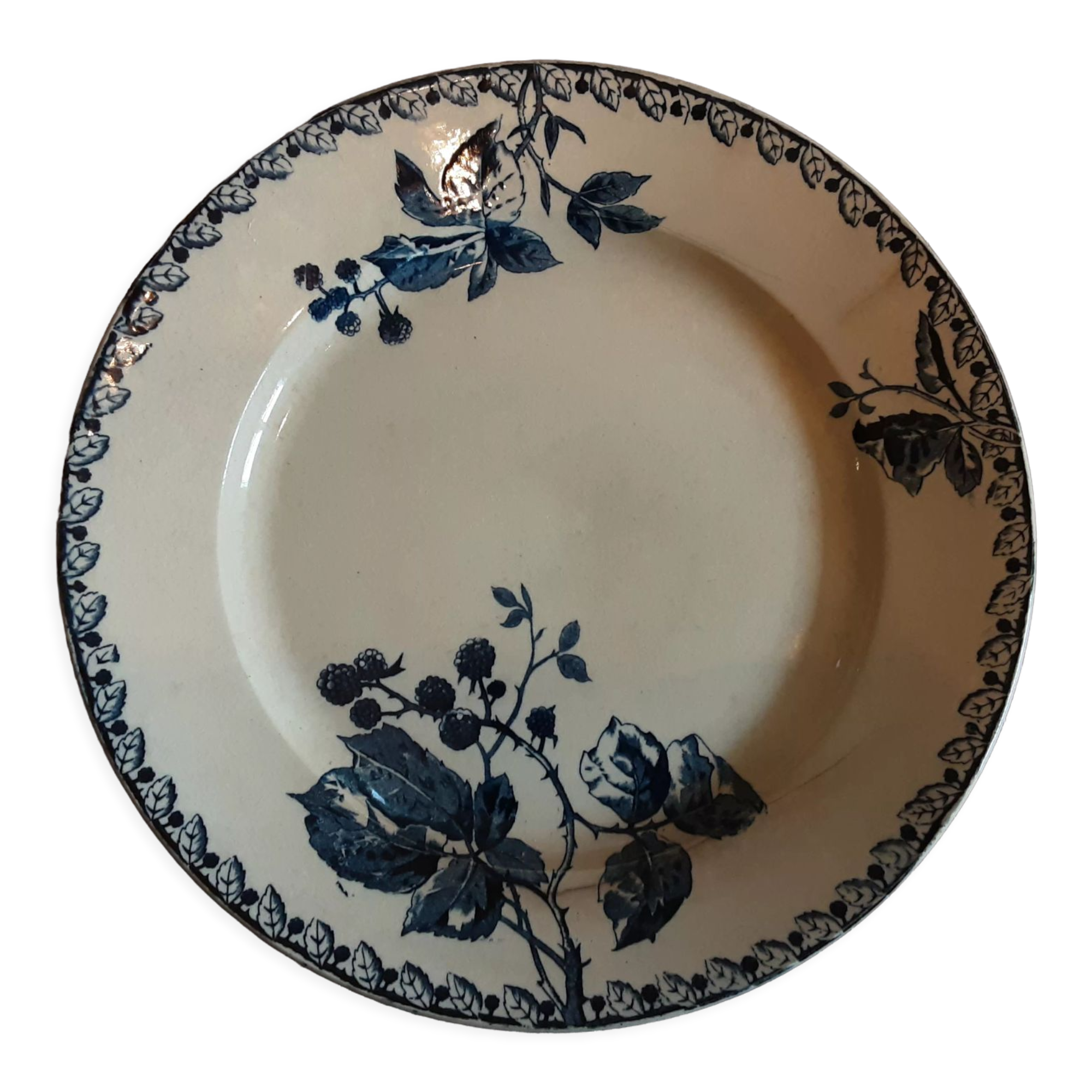 Ancient round iron earth dish