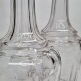 Set of two carved crystal decanters, 24 cm