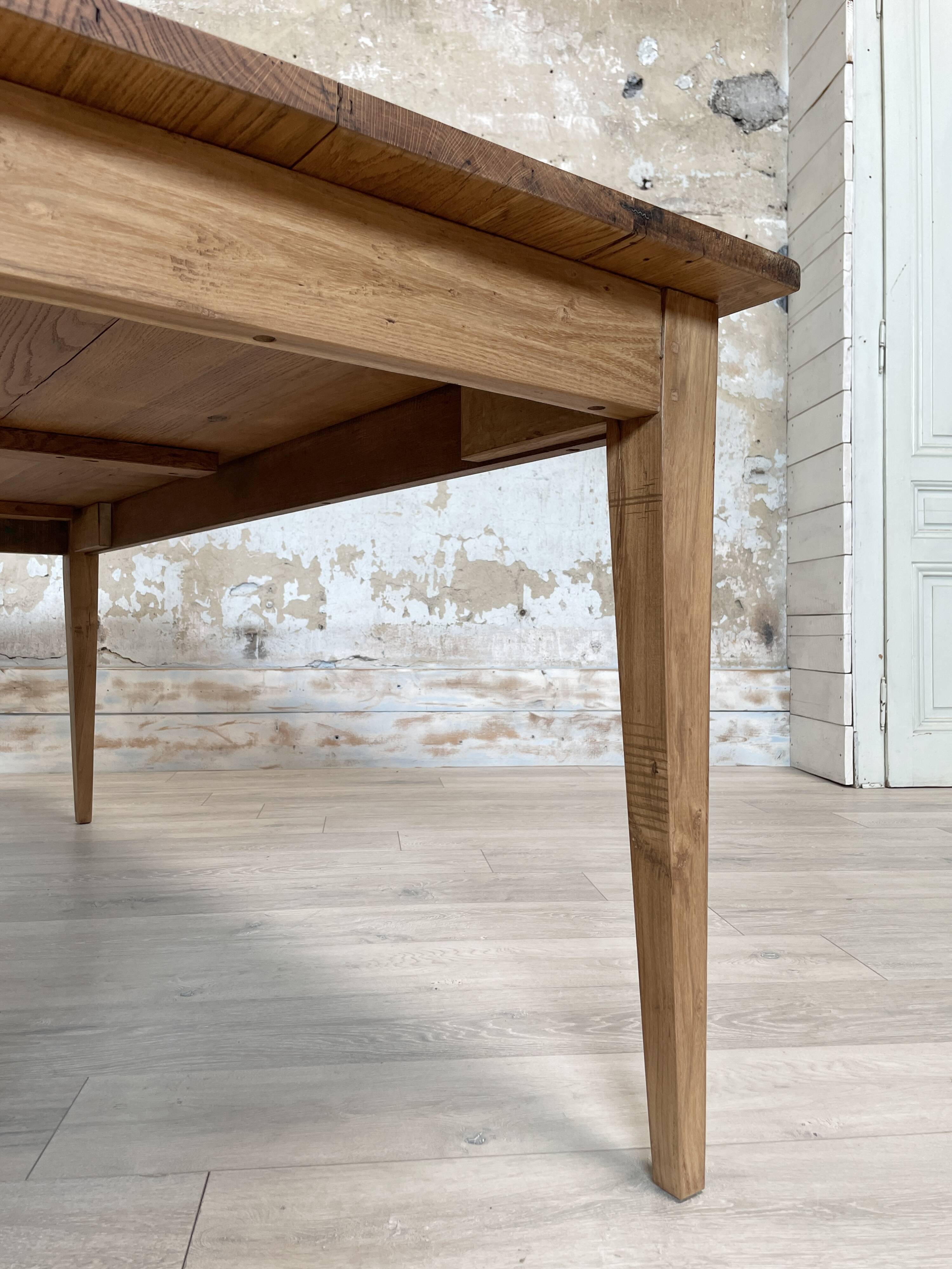 Vintage farm table with spindle legs.