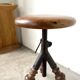 Tripod workshop stool in turned wood and cast iron — circa 1900