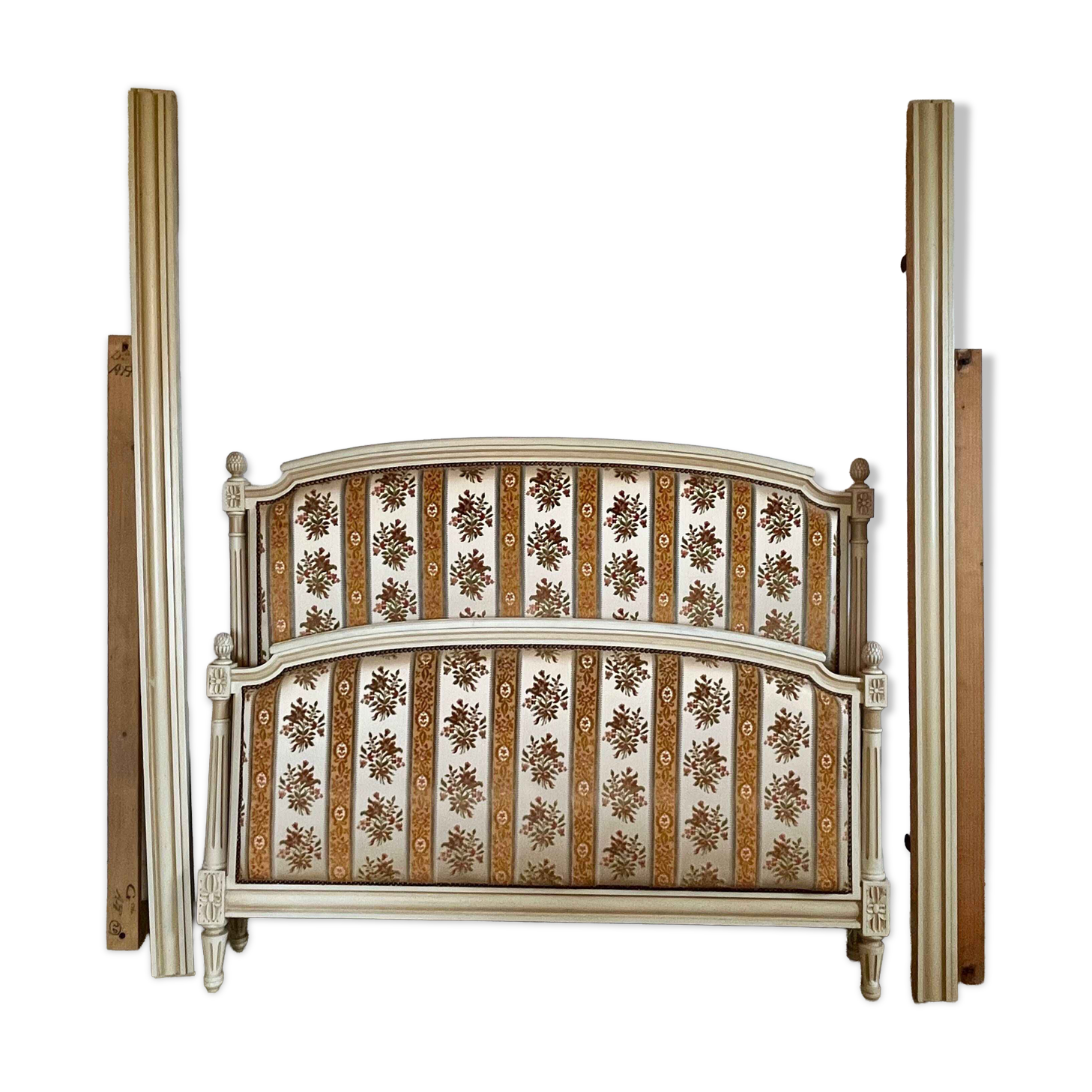 Louis XVI style bed in patinated wood with fluted columns.