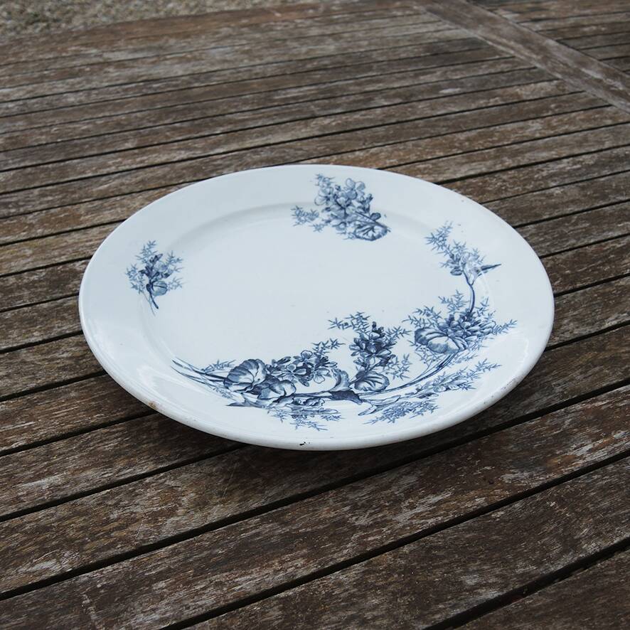 Old ironstone dish with blue floral decoration