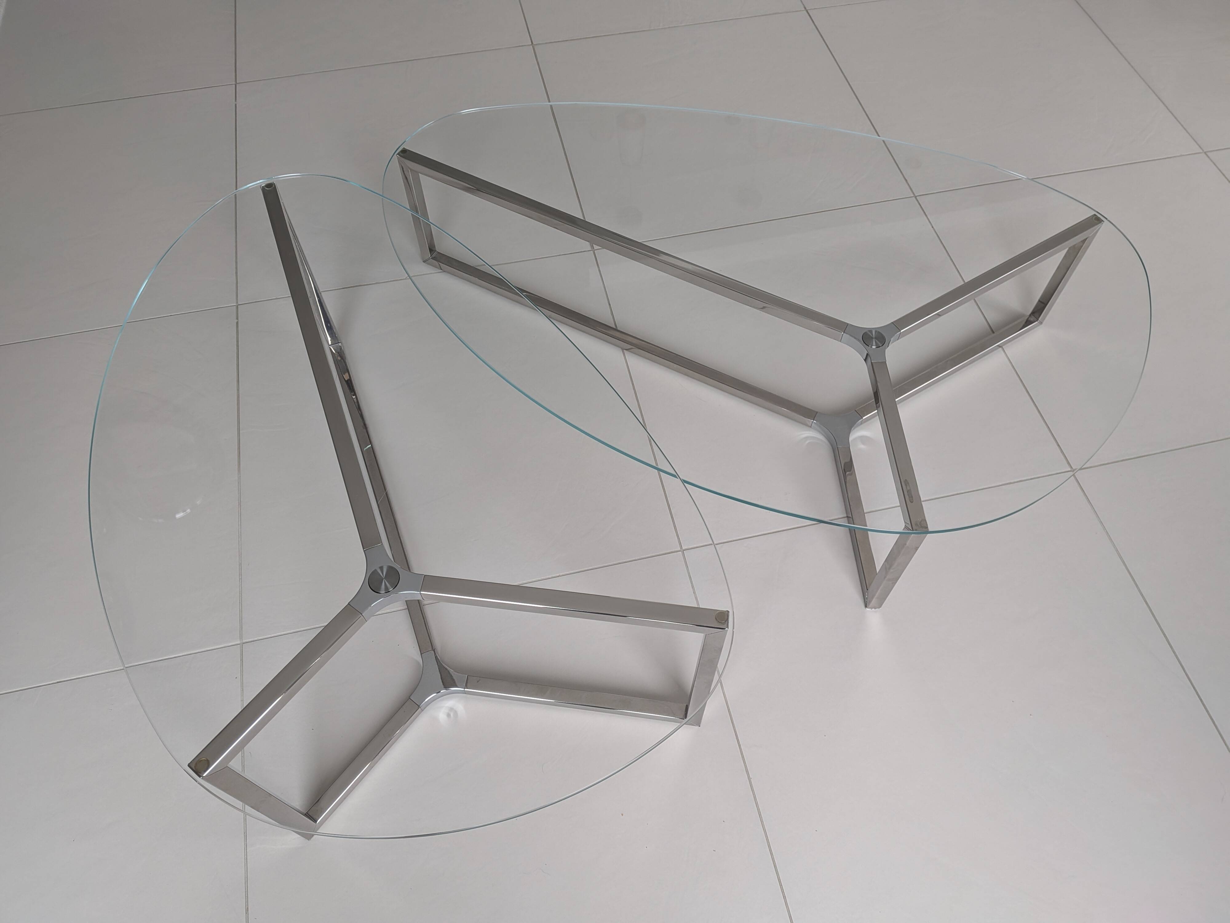 2 oval glass and chrome coffee tables, nesting, stackable, "gal" shape.
